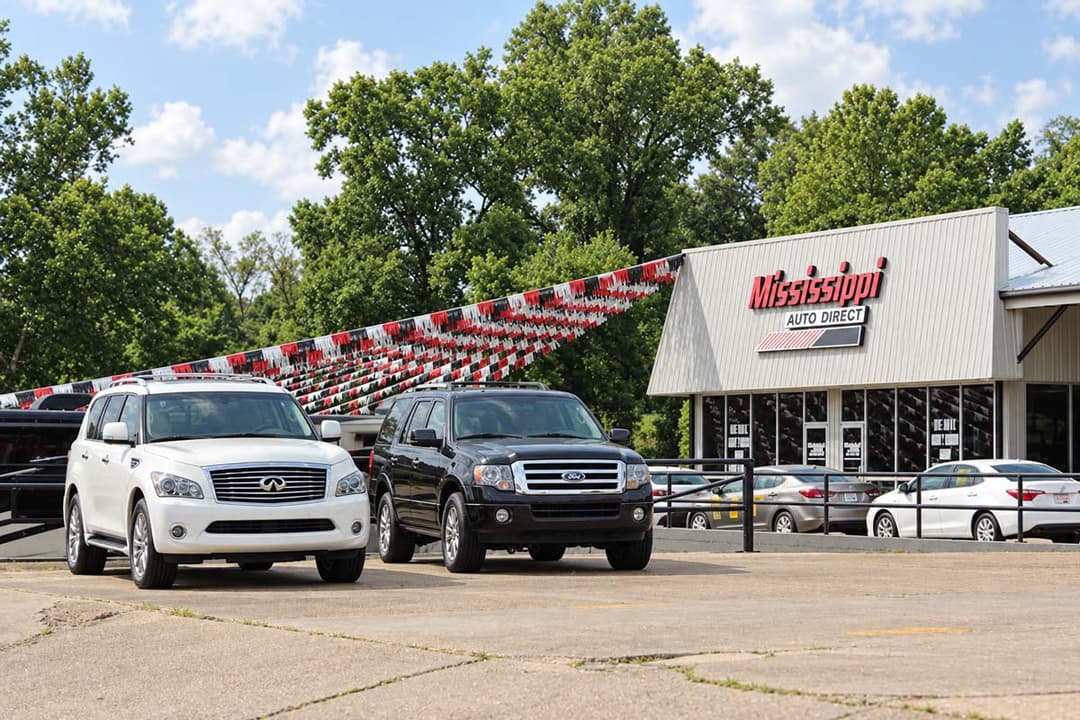 SUVs outside the Mississippi Auto Direct sales building